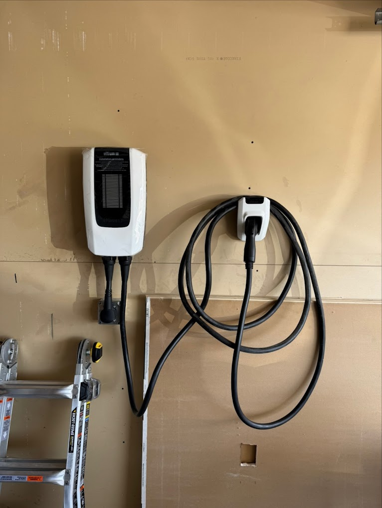 EV charger and Ultium power unit mounted with conduit run