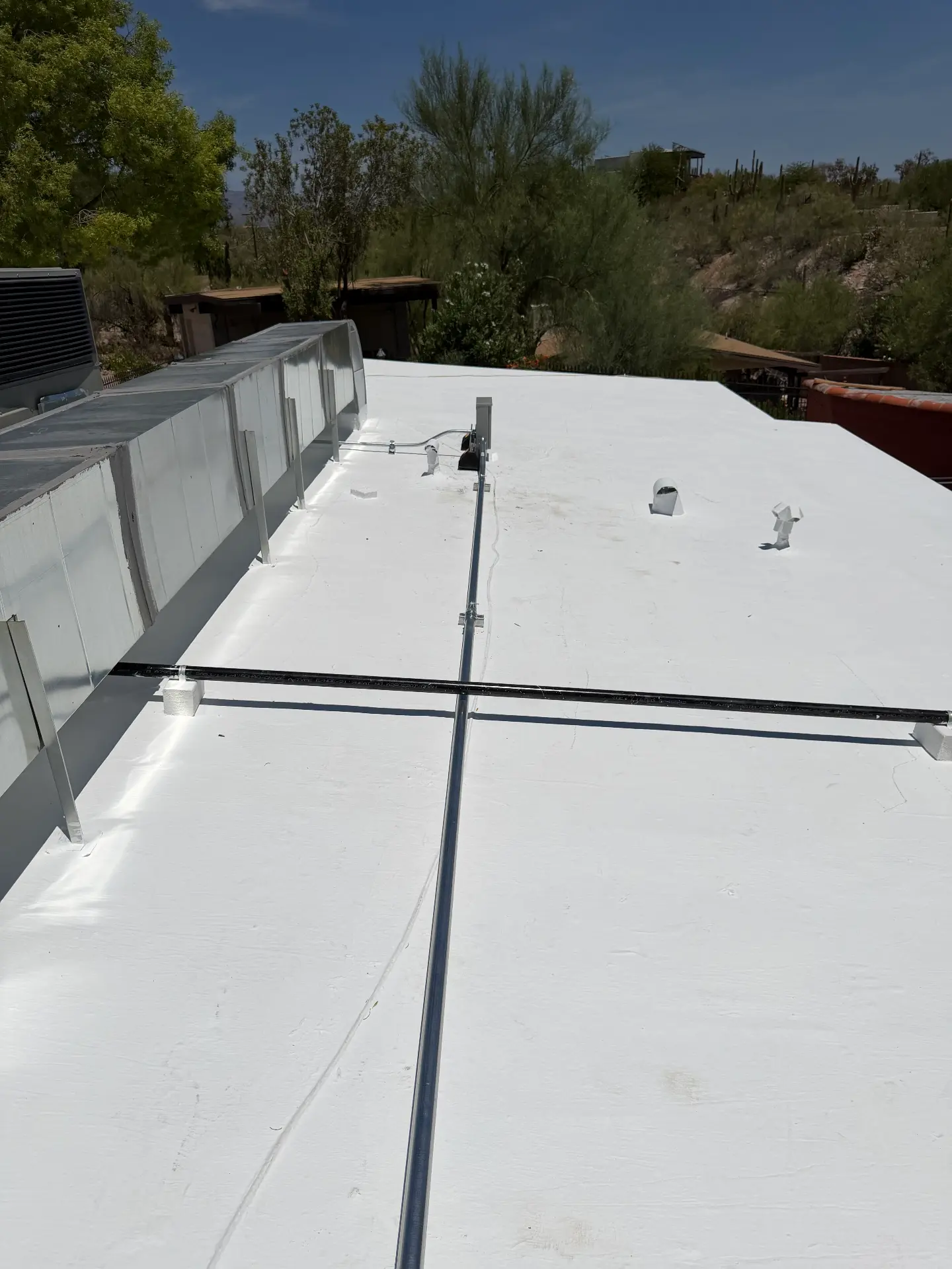Rooftop equipment power feed with conduit and disconnect