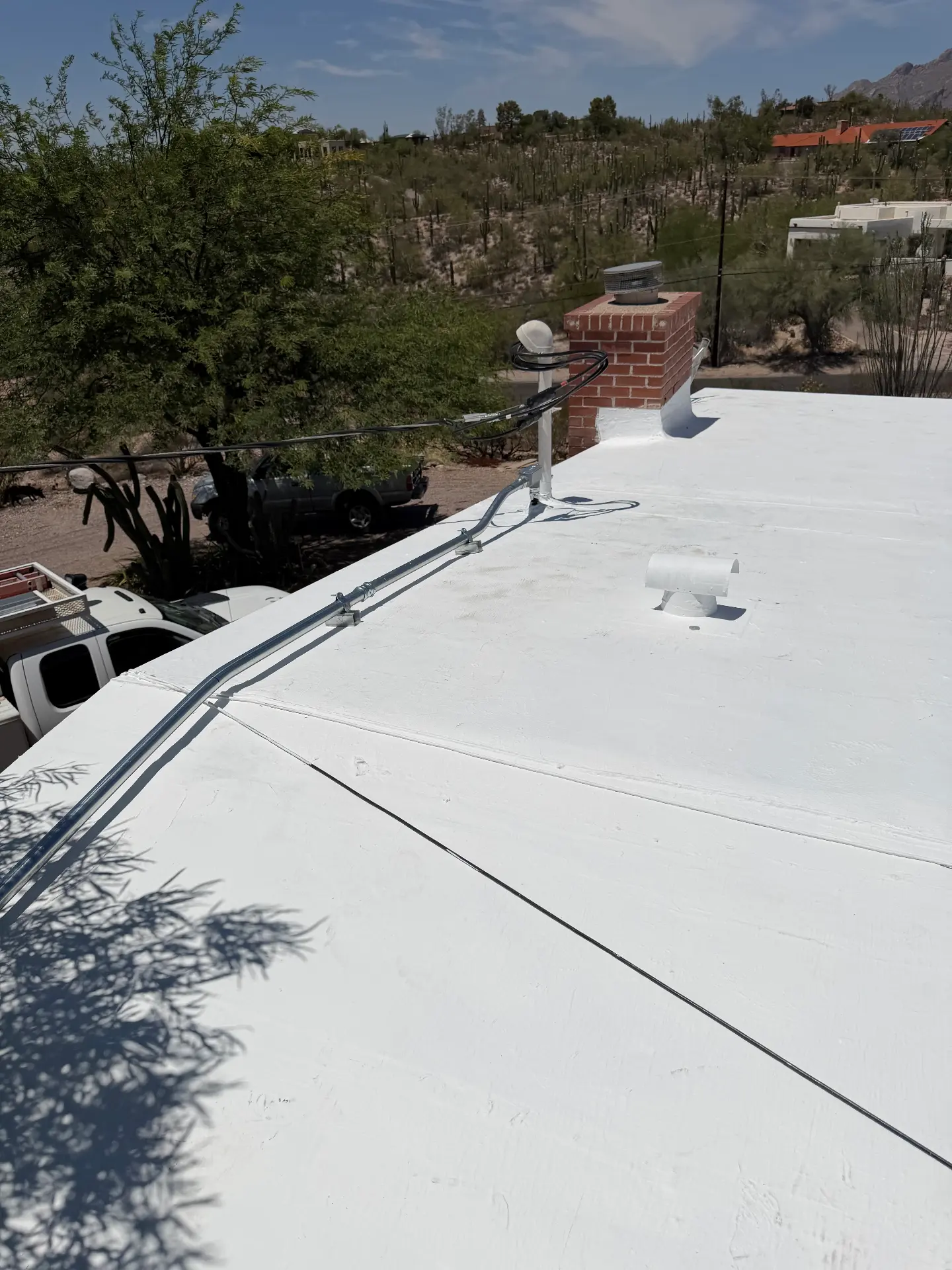 Rooftop conduit and satellite equipment power connection