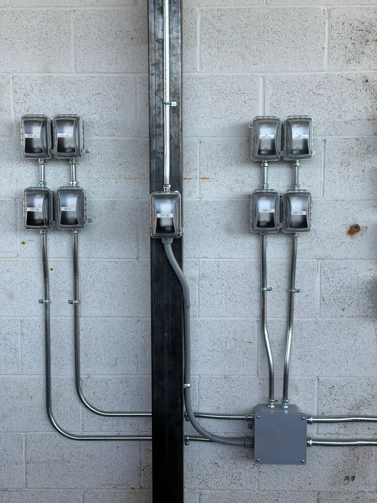 Weatherproof exterior outlets and labeled circuits with conduit