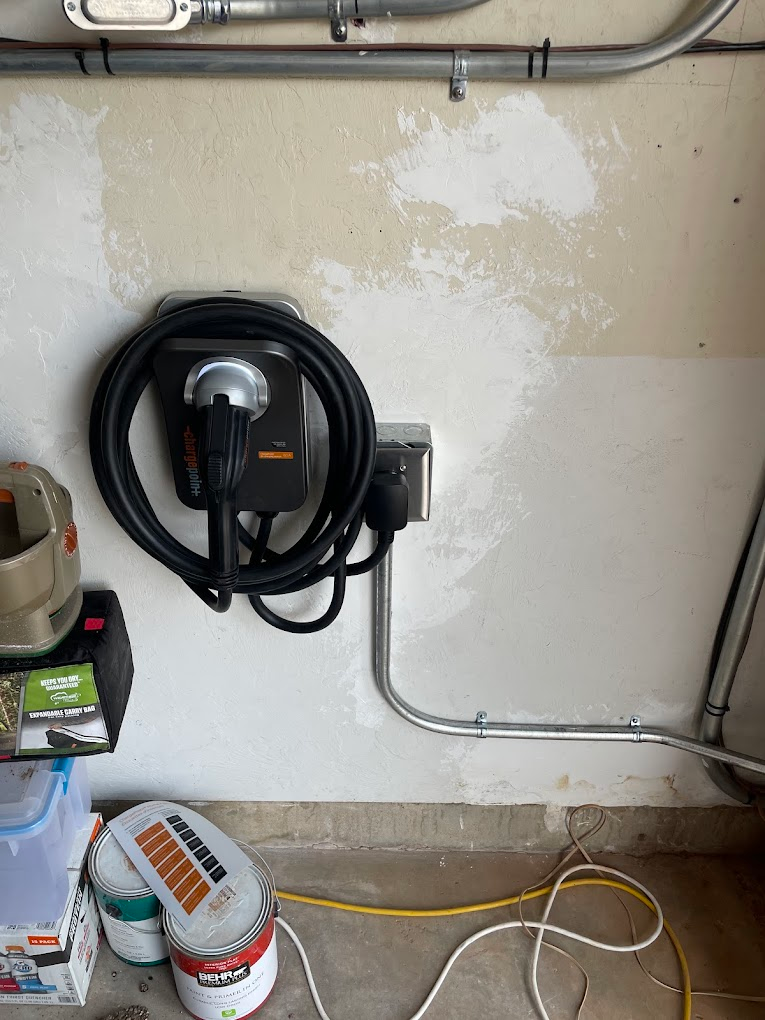Level 2 EV charger installed in a residential garage